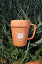 Mug in plants